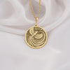 14K Gold Quetzal Bird Pendant inspired by Maya culture, featuring intricate feather details. This elegant gold jewelry is perfect for women who love nature-inspired designs and mythical bird symbolism.